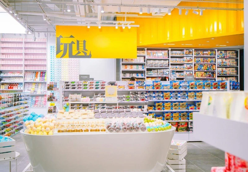 A colourful product wall and toy displays at KKV