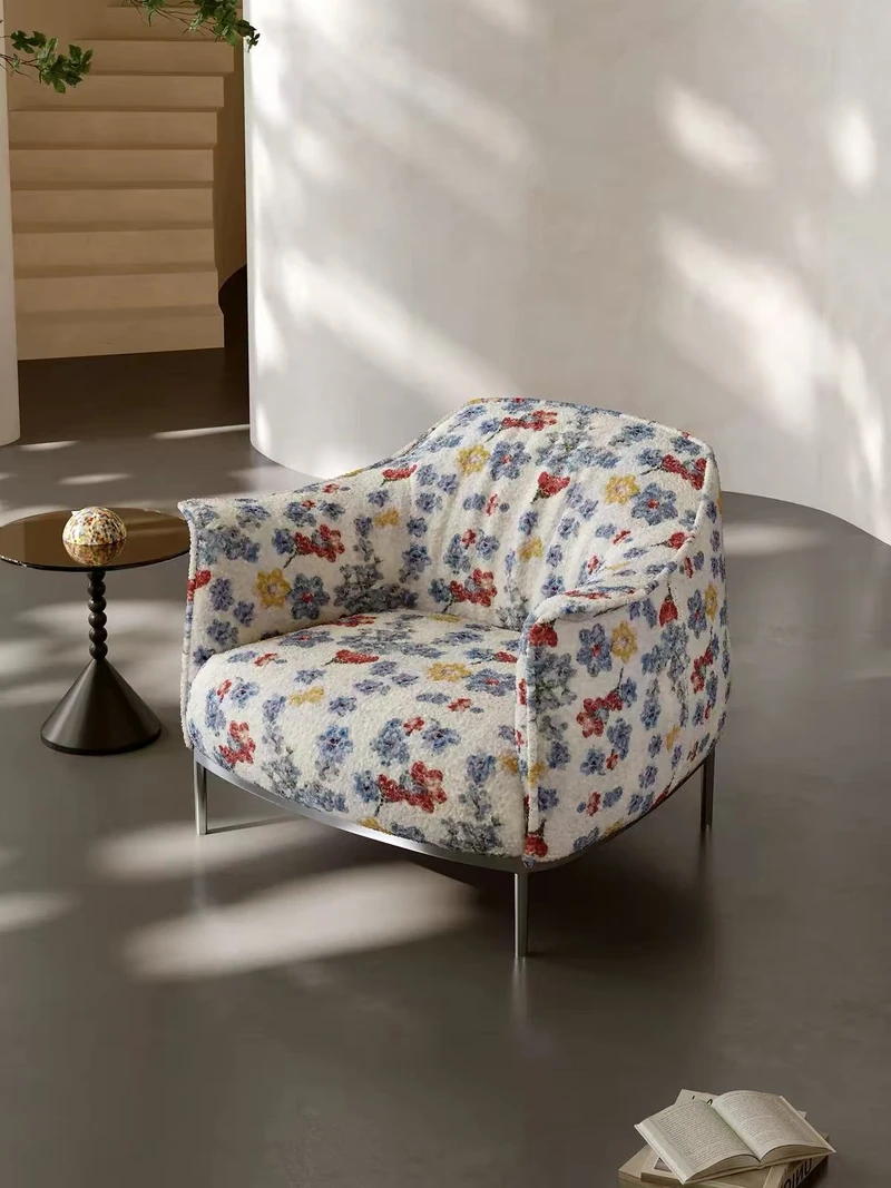 Floral lounge chair shown at an angle