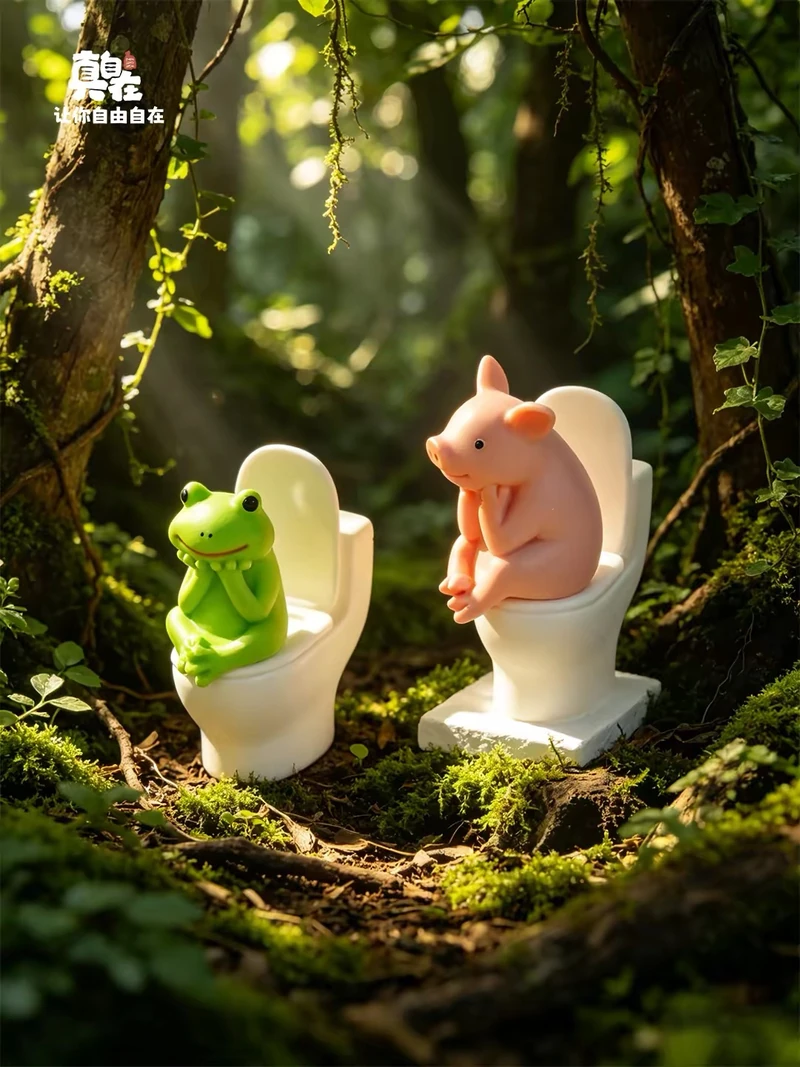 Pig and frog figures sitting on miniature toilets in a forest-styled promotional scene