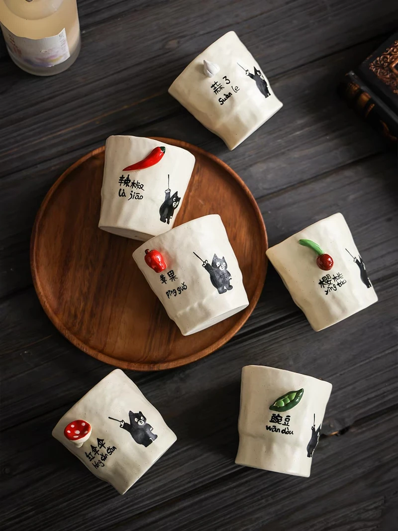 Hand-pinched cat / food cups